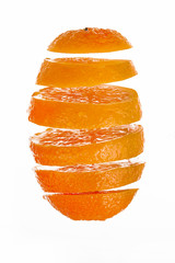 Juicy sliced orange on a white background.