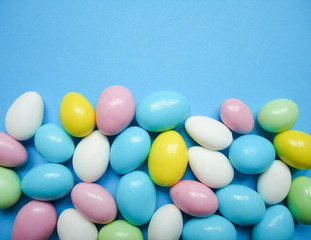 colorful candies on blue background