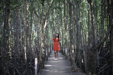Obraz premium A woman standing at Tung Prong Thong at Rayong, Thailand