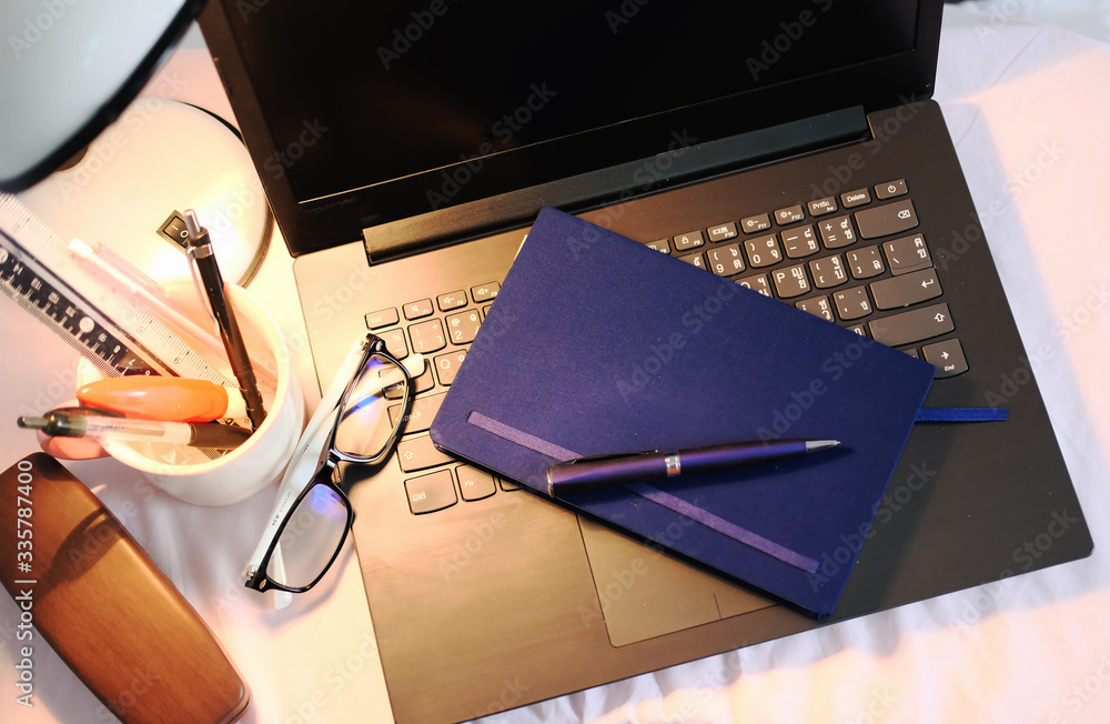 Poster notebook and pen on table background