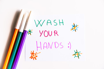 Drawing made by a child to remind him to wash his hands thoroughly to prevent the coronavirus. Wash your hands.