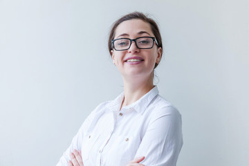 Beautiful happy girl smiling. Beauty simple portrait young smiling brunette woman in eyeglasses...