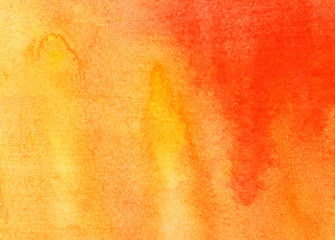 Naklejka premium Bright yellow and orange abstract watercolor background