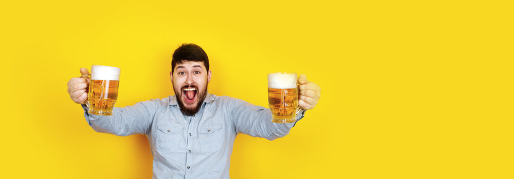 cheerful alcoholic man with two  glasses of beer, image over trendy yellow background, panoramic mock-up
