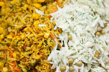 Closeup of rice and fresh cabbage salad with selective focus