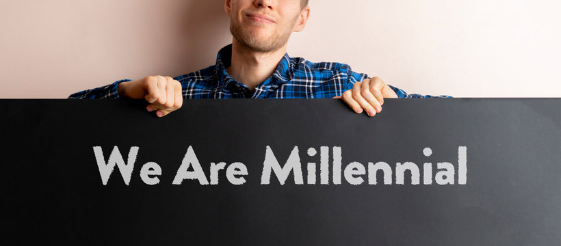 we are millenial text words on the colorful cardboard banner, new generation concept