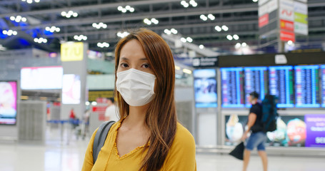 Woman wear medical mask at airport