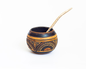 Mate gourds and bombilla - yerba mate vessels made out of calabash. cup of mate from South America. White isolated background. Typical drink from Brazil, Argentina, Uruguay and paraguay
