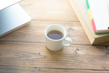 Computer, book and coffee on a wooden windowsill, window
