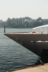 Detail shot of the front of a luxury yacht moored at Pyrmont.