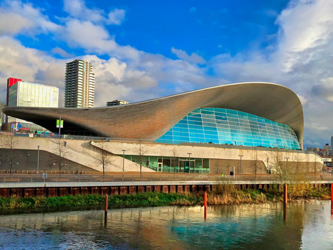 London, United Kingdom - December 20, 2019:  The Aquatics Centre at the new Queen Elizabeth Olympic Park on April 16, 2014, designed by Zaha Hadid Architects, 