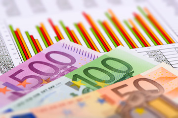 Euro Banknotes and financial chart