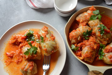 Cabbage rolls stuffed with ground beef and rice in tomato sauce