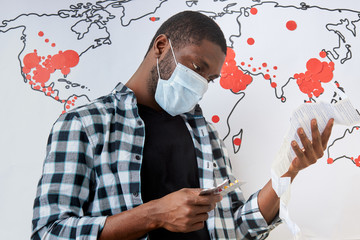 black man read instructions for taking medicaments against coronavirus, first symptoms of COVID-19....