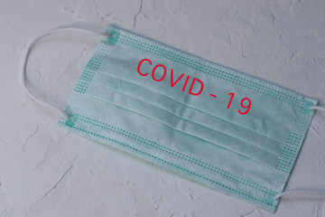 medical protective mask on white background. Disposable surgical face mask that covers mouth and...