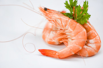 fresh shrimp on white plate with ingredients coriander / cooking seafood shrimps prawns served white background close up shrimp
