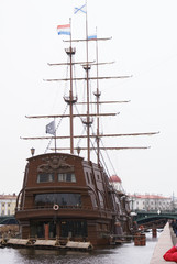 Naklejka premium Ancient ship on the river