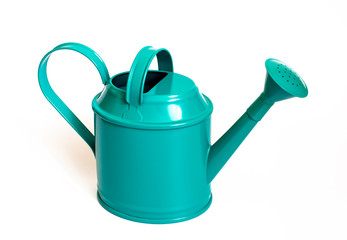 Vintage metal watering can with turquoise color isolated on white background