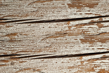 Texture of old board. Wooden scratched and dirty surface. White polished paint on the board. The table is painted with paint.