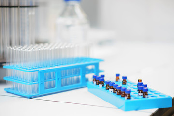 Box with test tubes and medical tests on a table in a special laboratory.
