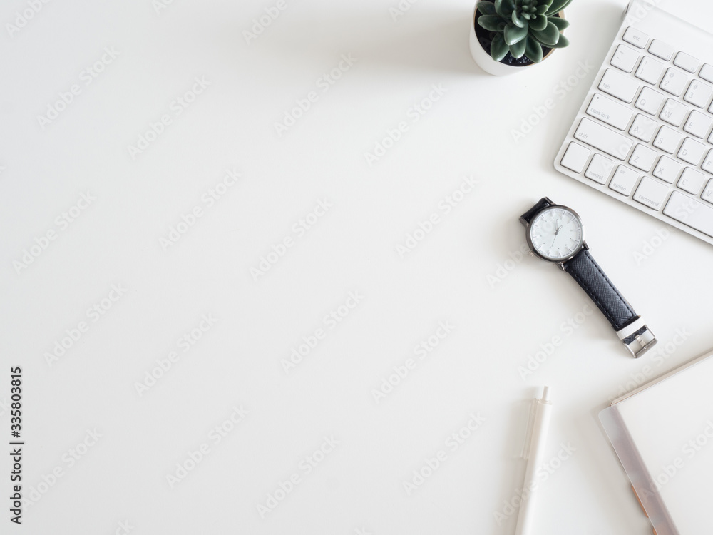 Poster top view of work from home concept with keyboard, calculator and notebook on white background, graph