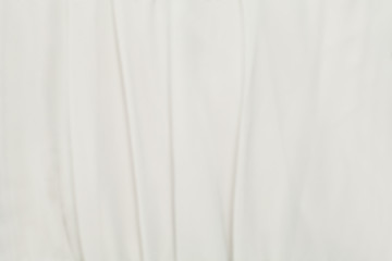 White silk smooth background. Fabric satin texture.