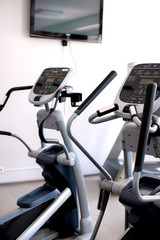 gym cardio equipment in a sunny day
