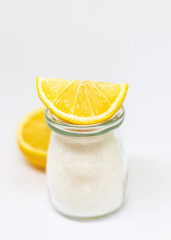 Citric acid on a white isolated background. Selective focus.