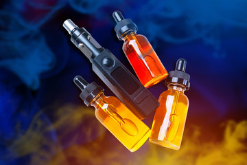 Blue and yellow collage on the theme of vaping. Electronic cigarette and vials with bright liquids...