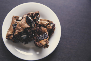 Tasty chocolate dessert with dark cookies 