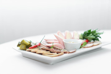 sliced on a white plate and a light background