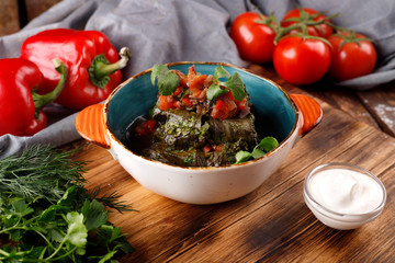 Dolma stuffed with grape leaves with rice and meat. The view from the top.