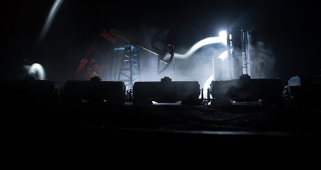 Train moving in fog. Ancient steam locomotive in night. Night train moving on railroad. orange fire background. Horror mystical scene