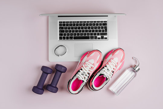 Flat Lay Shot Of Woman's Sport Accessories. Leggins, Sneakers, Earphones,  Phone And Top. Ready To Do Some Workout. Stock Photo, Picture and Royalty  Free Image. Image 58419441.