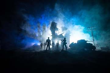 Obraz na płótnie Canvas War Concept. Military silhouettes fighting scene on war fog sky background, World War Soldiers Silhouette Below Cloudy Skyline At night.