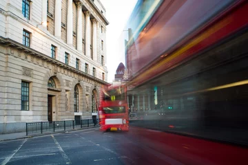 Zelfklevend Fotobehang Rode bus in beweging in City of London © Deyan Georgiev