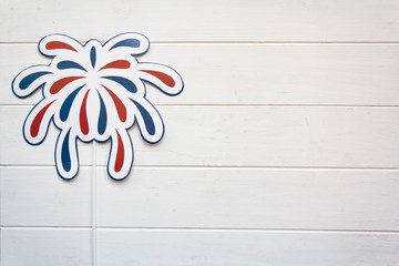 Firework props on white wooden table with copy space