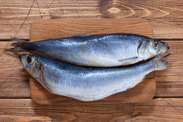 Step-by-step preparation of salted herring, step 2 - preparation of fresh herring for salting, top...