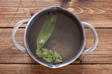 Step-by-step preparation of salted herring, step 3 - preparation of marinade, top view, selective focus