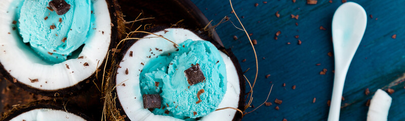 Banner of Blue ice cream in coconut bowl.