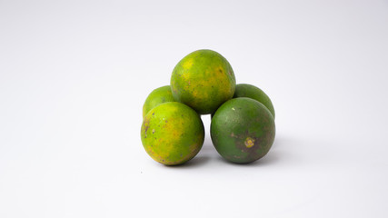 lemon lime fresh juice (Citrus Sinensis) or Jeruk nipis, isolated on white background.