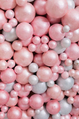 background texture of foam balloons. a wall of balloons. pink and white balloons