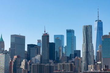 Fototapeta na wymiar Lower Manhattan New York City Skyline Scene with a Clear Blue Sky