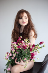 girl in black bodysuit with flowers