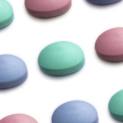 pink green and blue soap on a white background pattern