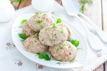 Dietary turkey cutlets steamed with fresh herbs, selective focus
