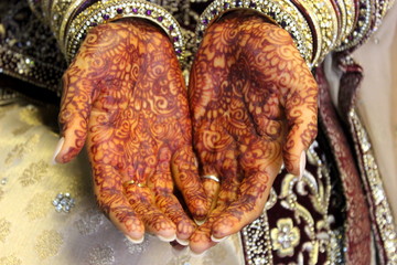Henna on brides hands for wedding ceremony