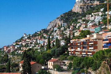 View of the perched fortified medieval village overlooking Roquebrune-Cap-Martin and the Mediterranean Sea on the French Riviera