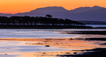Fantastic sunset view over sea-coast
