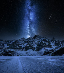 Snowy Morskie Oko mountain lake in winter at night